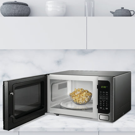 Danby (DDMW1125BBS) Designer 1.1 cu. ft. Countertop Microwave in Stain